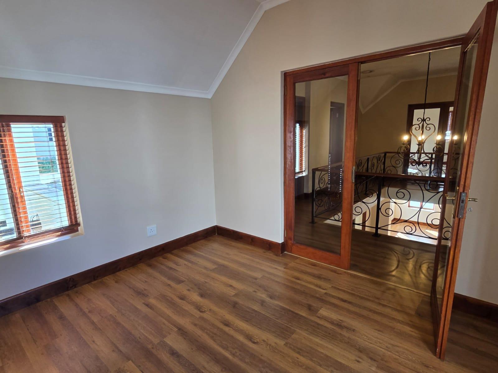 Refined Estate Living with Indoor Pool — photograph 2